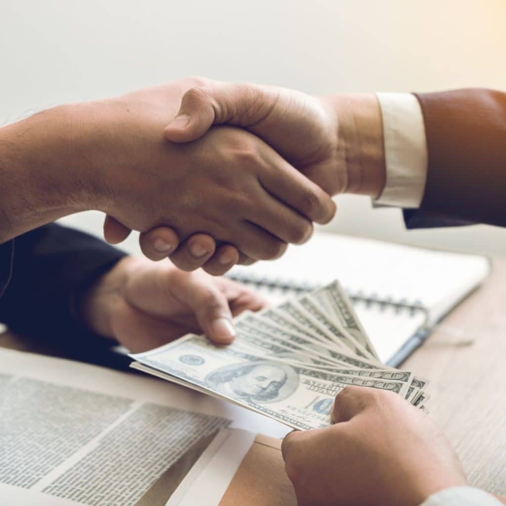 lender and investor shaking hands